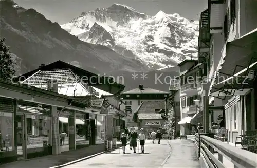 AK / Ansichtskarte Wengen__BE Dorfstrasse m. Jungfrau 