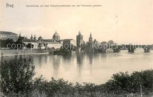 AK / Ansichtskarte Prag__Prahy_Prague Karlsbruecke m. d. Kreuzherrenkloster  