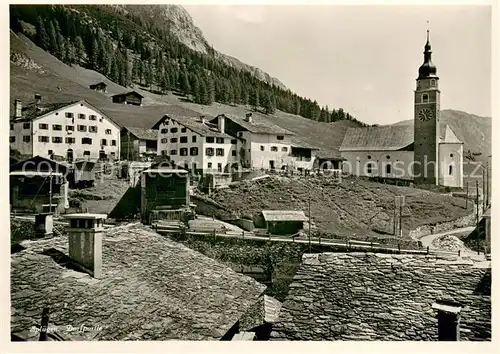 AK / Ansichtskarte Spluegen_GR Dorfansicht mit Kirche Spluegen_GR