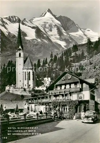 AK / Ansichtskarte Heiligenblut_Kaernten Hotel Glocknerwirt mit Grossglockner Heiligenblut Kaernten