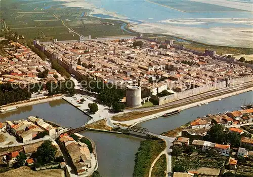 AK / Ansichtskarte Aigues Mortes_30 La Ville du Roi Saint Louis Vue aerienne 