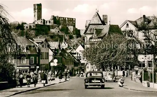 AK / Ansichtskarte Koenigstein__Taunus Hauptstrasse mit Blick zur Burg 