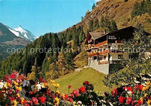 AK / Ansichtskarte Heiligenblut_Kaernten Pension Laerchenhof Aussenansicht m. Grossglockner Heiligenblut Kaernten