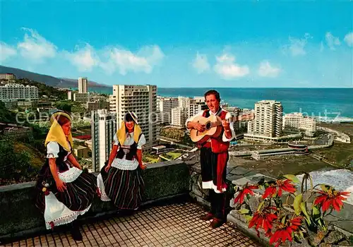 AK / Ansichtskarte Puerto de la Cruz_Tenerife_ES Trajes Tipicos al fondo Vista general 
