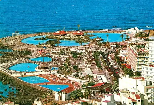 AK / Ansichtskarte Puerto de la Cruz_Tenerife_ES Fliegeraufnahme Schwimmbaeder u. Meer Ansicht 
