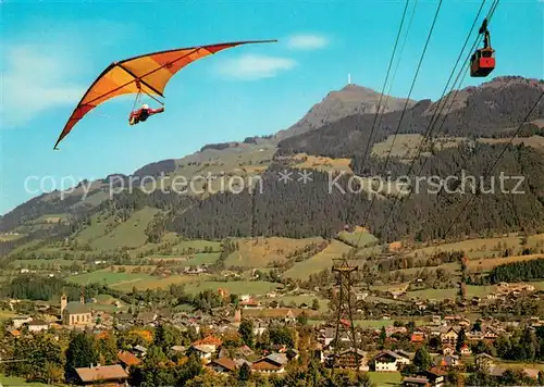 AK / Ansichtskarte Kitzbuehel_Tirol mit Hahnenkamm und Kitzbueheler Horn Drachenflieger Seilbahn Kitzbuehel Tirol