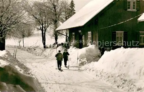 AK / Ansichtskarte Bischofsheim_Rhoen Fremdenpension Rhoenhaeuschen im Winter Bischofsheim Rhoen