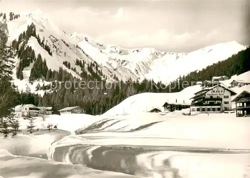 AK / Ansichtskarte Baad_Mittelberg_Kleinwalsertal Alpensporthotel Baad Im Winter Schnee Baad_Mittelberg