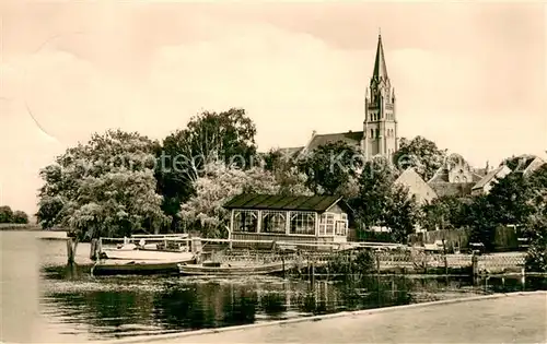 AK / Ansichtskarte Roebel_Mueritz Partie am Mueritzsee Blick zur Kirche Roebel Mueritz