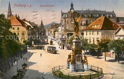 AK / Ansichtskarte Freiburg_Breisgau Kaiserstrasse mit Siegesdenkmal Freiburg Breisgau