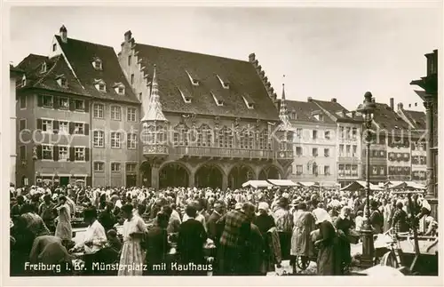 AK / Ansichtskarte Freiburg_Breisgau Muensterplatz mit Kaufhaus Freiburg Breisgau
