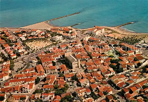 AK / Ansichtskarte Les_Saintes Maries de la Mer La Camargue Vue generale aerienne Les