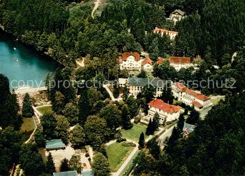 AK / Ansichtskarte Bad_Sachsa_Harz Kurpark mit Kurhaus und Schmelzteich Fliegeraufnahme Bad_Sachsa_Harz