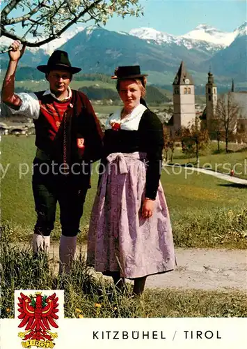 AK / Ansichtskarte Kitzbuehel_Tirol Trachtenpaar Kirche Panorama Kitzbuehel Tirol