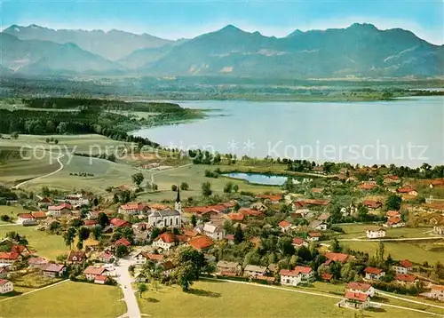 AK / Ansichtskarte Chieming_Chiemsee Fliegeraufnahme mit Wildem Kaiser und Kampenwand Chieming Chiemsee