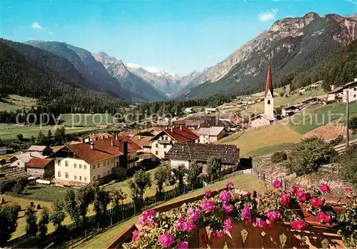 AK / Ansichtskarte Trins_Innsbruck Ortsansicht mit Kirche Blick gegen Stubaier Alpen Trins Innsbruck