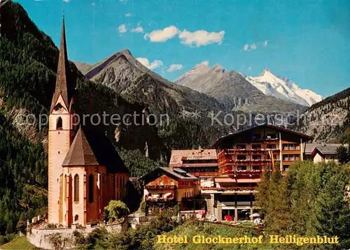 AK / Ansichtskarte Heiligenblut_Kaernten Hotel Glocknerhof Aussenansicht m. Kirche Heiligenblut Kaernten