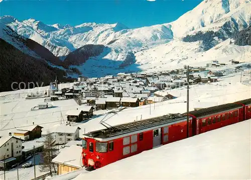 AK / Ansichtskarte Sedrun GEsamtansicht geg. Rueras u. d. Skigebiet v. Milez m. Bahn Winter Sedrun
