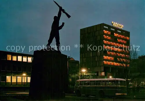 AK / Ansichtskarte Salgotarjan_HU Hotel Karancs mit Raeterepublikdenkmal Nachtaufnahme 