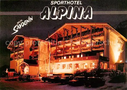 AK / Ansichtskarte Savognin Sporthotel Alpine Nachtaufnahme Savognin