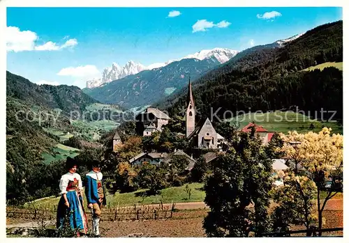 AK / Ansichtskarte Gudon_Gufidaun_Chiusa_IT Trachten Dorfansicht mit Kirche Landschaft Dolomiten 