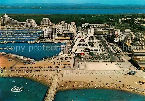 AK / Ansichtskarte La_Grande Motte_34 Vue aerienne La place de lEpi et la rue du Casino Le port 