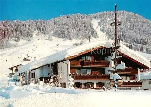 AK / Ansichtskarte Reit_Winkl Gaestehaus Maria und Addi Hellwig Winterlandschaft Alpen Reit_Winkl