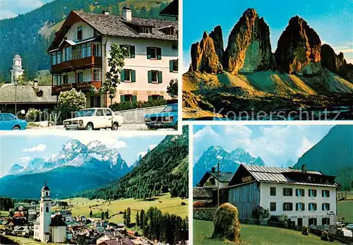 AK / Ansichtskarte Sexten_Sesto_Suedtirol_IT Hotel Bergsteiger Ortsansicht mit Kirche Dolomiten 