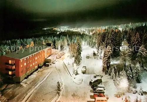 AK / Ansichtskarte Vysoke_Tatry_SK Fliegeraufnahme Sporthotel bei Nacht Winter Schnee 