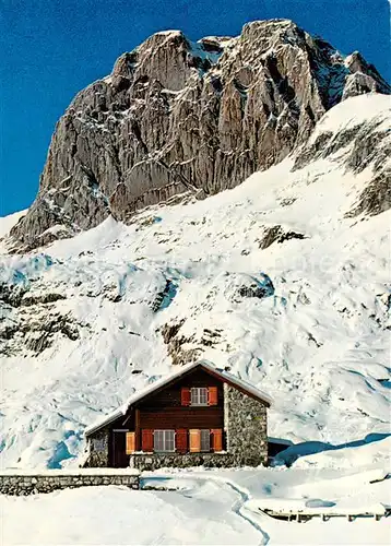 AK / Ansichtskarte Toggenburg_SG Zwinglipass Huette Berghaus Alpen im Winter 