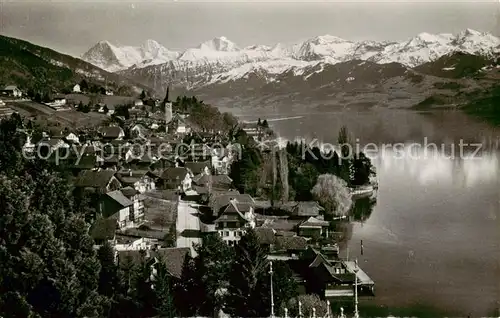 AK / Ansichtskarte Hilterfingen_Thunersee_BE Gesamtansicht m. Eiger Moench Jungfrau 