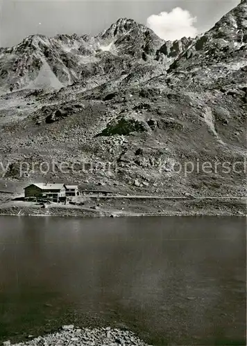 AK / Ansichtskarte Flueela Hospitz_2389m_Flueelapass_GR mit Weisshorn Fliegeraufnahme 