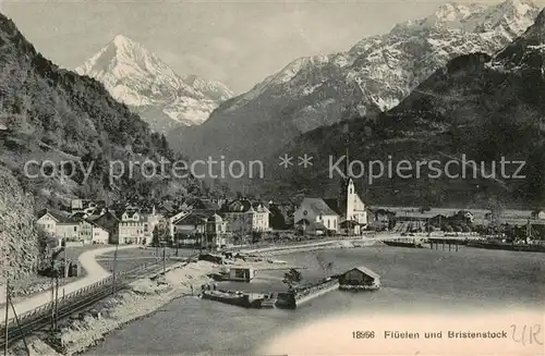 AK / Ansichtskarte Flueelen_UR Ortsansicht mit Kirche Blick gegen Bristenstock Glarner Alpen Flueelen_UR