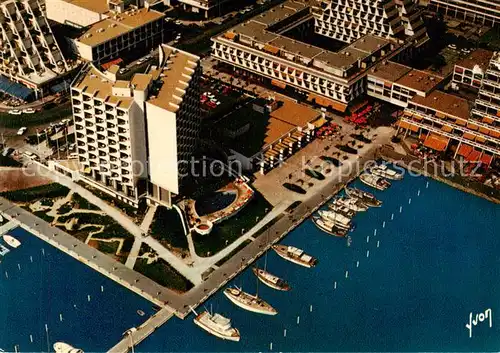 AK / Ansichtskarte La_Grande Motte_34 Au premier plan Hotel Frantel Le Jean Bart le Cormoran le Grand Pavois Vue aerienne 