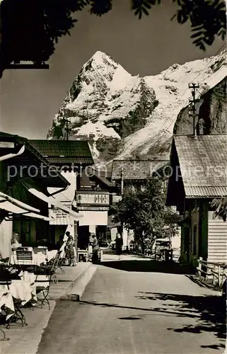 AK / Ansichtskarte Muerren_BE Dorfstrasse mit Eiger Berner Alpen Muerren_BE