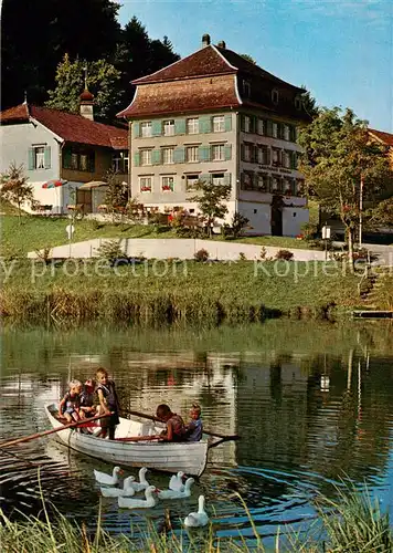 AK / Ansichtskarte Magdenau_Botsberg_Flawil_SG Landgasthof Roessli Uferpartie am Teich Enten Ruderboot 