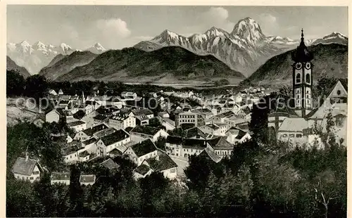 AK / Ansichtskarte  Bad_Aibling Ortsansicht mit Kirche Blick gegen die Alpen Kuenstlerkarte Bad_Aibling