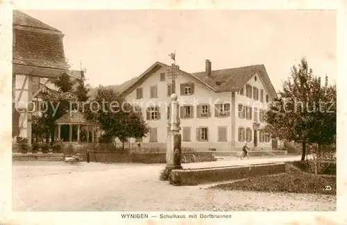 AK / Ansichtskarte Wynigen_BE Schulhaus mit Dorfbrunnen 