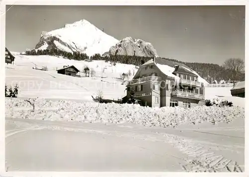 AK / Ansichtskarte Lisighaus_Wildhaus_SG Hotel Pension Erika Winterpanorama 