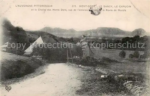 AK / Ansichtskarte Mont Dore les Bains_63_Puy de Dome Le Sancy Le Capucin et la Chaine des Monts Dore vue de lembranchement de la Route de Murols 