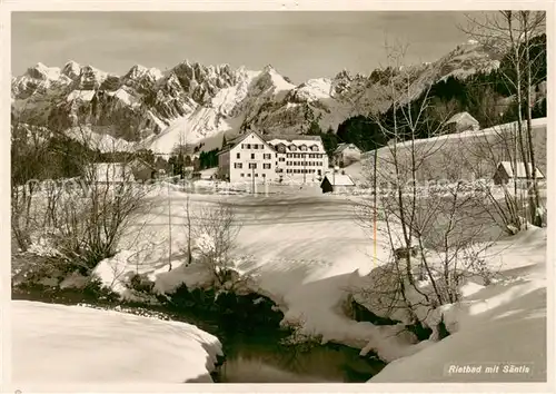 AK / Ansichtskarte Rietbad_930m_Toggenburg_SG Winterlandschaft Blick gegen Saentis Appenzeller Alpen 