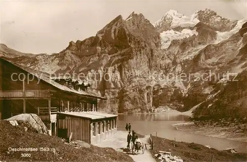 AK / Ansichtskarte Oeschinensee_oeschinensee_1578m_BE Berghotel am See Berner Alpen 