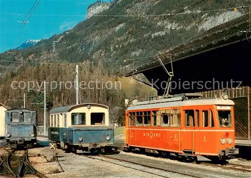 AK / Ansichtskarte Meiringen_BE Innertkirchen Bahn Traktor Ta 2 2 3 Trudi Triebwagen BDa 2 2 5 und Bem 4 4 6 Meiringen BE