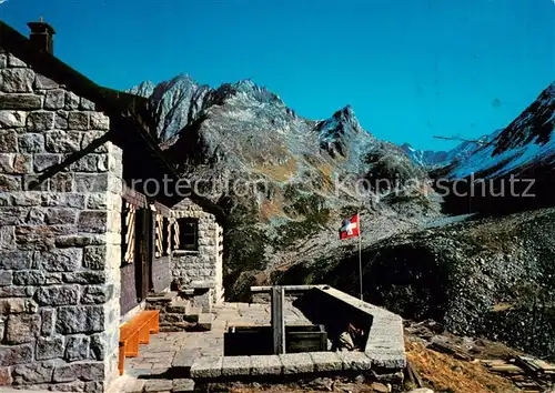 AK / Ansichtskarte Etzlihuette_2052m_Sedrun_GR Berghuette mit Witenalpstock und Chruetzlipass Glarner Alpen 