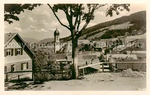 AK / Ansichtskarte  Nesselwang Ortspartie mit Kirche Nesselwang