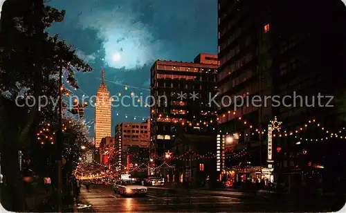 AK / Ansichtskarte  Mexico_City_D.F. Twilight descends on Avenue Juarez 