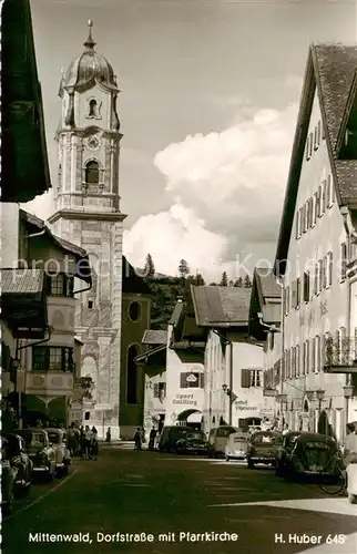 AK / Ansichtskarte 73804840 Mittenwald_Bayern Dorfstrasse mit Pfarrkirche Mittenwald Bayern