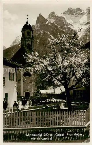 AK / Ansichtskarte 73806100 Mittenwald_Bayern Pfarrkirche mit Karwendel Mittenwald Bayern