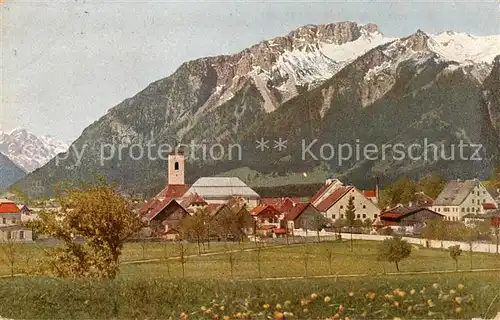 AK / Ansichtskarte 73807392 Reutte_Tirol Ortsansicht mit Kirche Blick gegen die Lechtaler Alpen Reutte Tirol