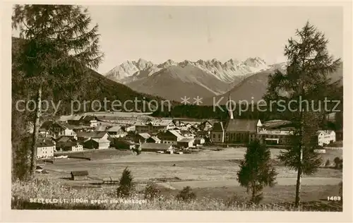 AK / Ansichtskarte 73807909 Seefeld_Tirol Ortsansicht mit Kirche Blick gegen Kalkkoegel Seefeld Tirol